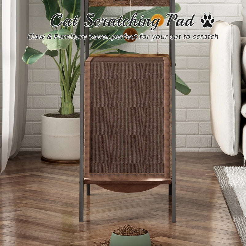 Front view close-up of the large brown sisal cat scratching pad attached to the rustic metal-framed cat tree tower in a cozy living room setting