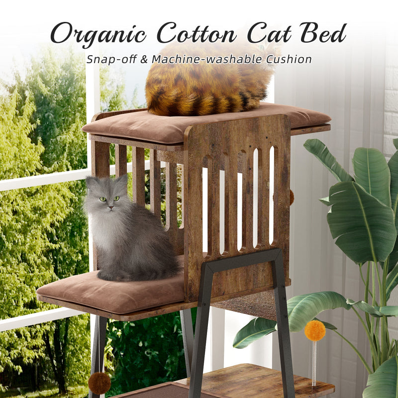 Close-up view of the rustic brown wooden cat tree tower featuring organic cotton cat beds with snap-off and machine-washable cushions, with cats relaxing near a sunny window