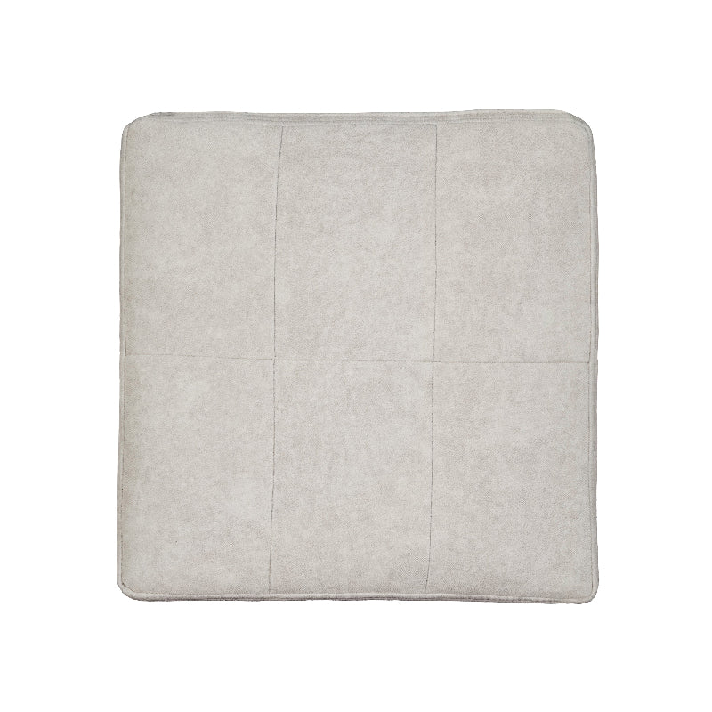 A top-down view of a square light gray fabric cushion with stitched grid patterns on a plain white background.
