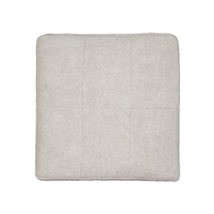 A top-down view of a square light gray fabric cushion with stitched grid patterns on a plain white background.